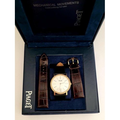 114 - A CASED PIAGET STYLE 18CT YELLOW GOLD WRISTWATCH, self-wind movement; currently keeping time. Maker’... 