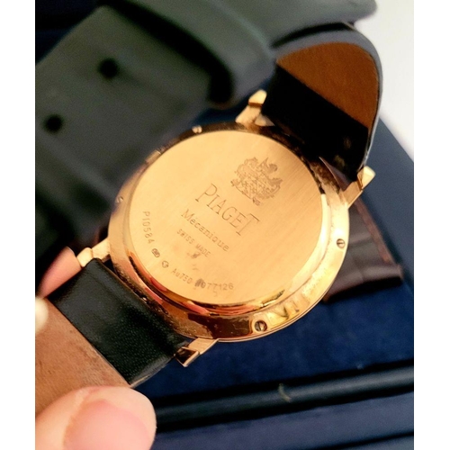 114 - A CASED PIAGET STYLE 18CT YELLOW GOLD WRISTWATCH, self-wind movement; currently keeping time. Maker’... 