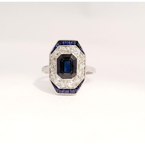 115 - A LOVELY VINTAGE ART DECO SAPPHIRE & DIAMOND CLUSTER RING, with an octagonal shaped central sapphire... 