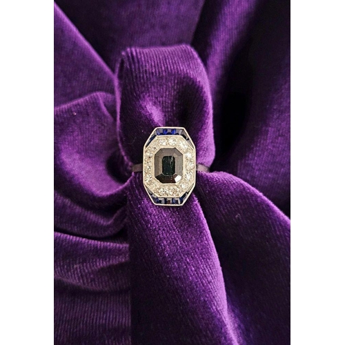 115 - A LOVELY VINTAGE ART DECO SAPPHIRE & DIAMOND CLUSTER RING, with an octagonal shaped central sapphire... 