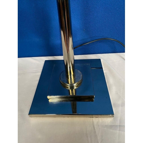 119 - A GOOD ADJUSTABLE CHROME DESK LAMP, the arm can be adjusted, on stepped square base. Dimensions: bas... 