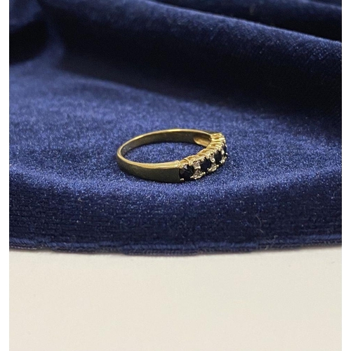 120 - A BEAUTIFUL 9CT YELLOW GOLD SAPPHIRE & DIAMOND BAND RING, with five round cut sapphires separated by... 