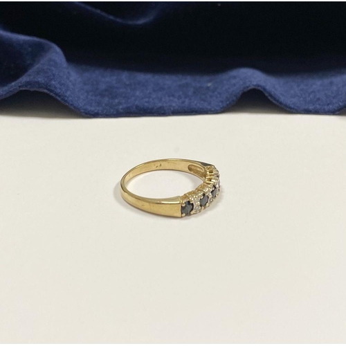 120 - A BEAUTIFUL 9CT YELLOW GOLD SAPPHIRE & DIAMOND BAND RING, with five round cut sapphires separated by... 