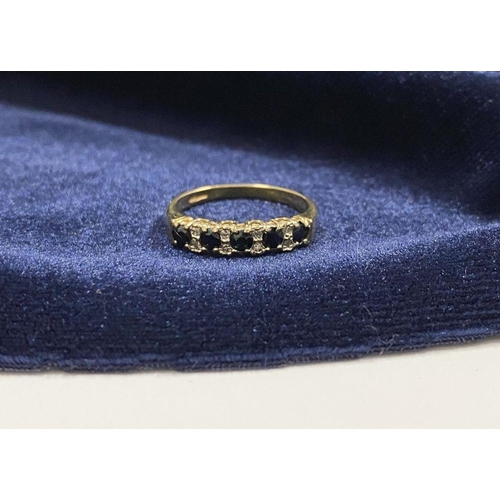 120 - A BEAUTIFUL 9CT YELLOW GOLD SAPPHIRE & DIAMOND BAND RING, with five round cut sapphires separated by... 