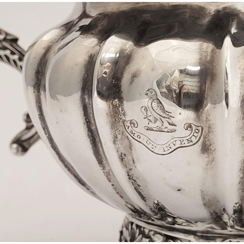 124 - A VERY GOOD  WILLIAM IV SILVER CREAM JUG, a beautifully decorated piece. Dating from 1834, created i... 