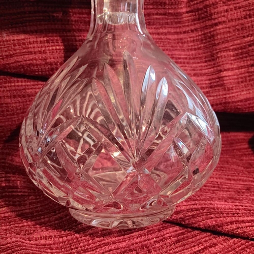 146 - A GOOD CUT GLASS DECANTER AND BOWL, the bowl with etched designs to body as well as cut glass. The d... 