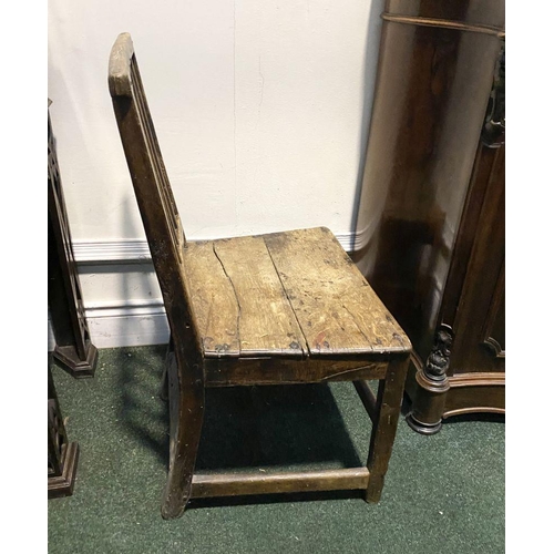 149 - A VINTAGE PROVINCIAL STYLE OAK DINING CHAIR, with four bar slatted back, straight legs joined by cro... 