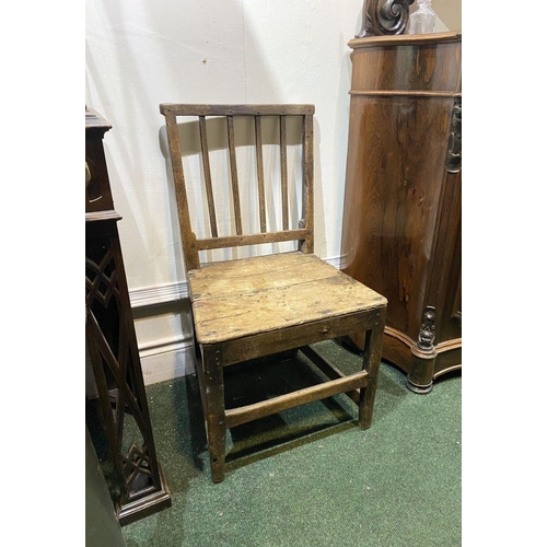 149 - A VINTAGE PROVINCIAL STYLE OAK DINING CHAIR, with four bar slatted back, straight legs joined by cro... 