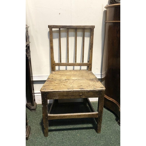 149 - A VINTAGE PROVINCIAL STYLE OAK DINING CHAIR, with four bar slatted back, straight legs joined by cro... 