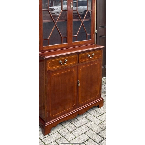 166 - AN EXCELLENT QUALITY IRISH MAHOGANY INLAID ASTRAGAL GLAZED LIBRARY BOOKCASE, to the top a dentil dec... 