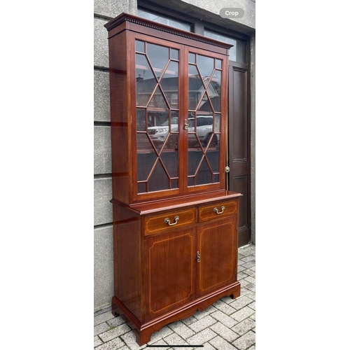 166 - AN EXCELLENT QUALITY IRISH MAHOGANY INLAID ASTRAGAL GLAZED LIBRARY BOOKCASE, to the top a dentil dec... 