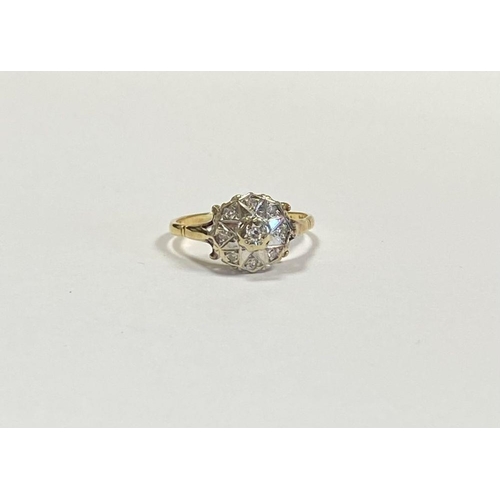 17 - A STRIKING 18CT YELLOW GOLD ART DECO STYLE DIAMOND CLUSTER RING, with central round cut diamond in i... 