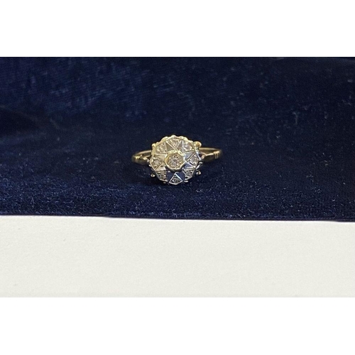 17 - A STRIKING 18CT YELLOW GOLD ART DECO STYLE DIAMOND CLUSTER RING, with central round cut diamond in i... 