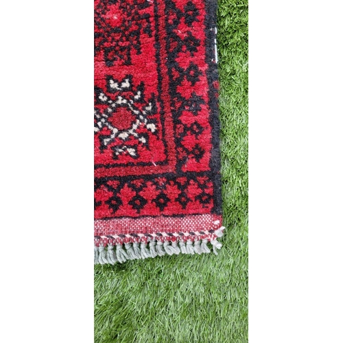 18 - A TRADITIONAL AFGHAN RUNNER RUG, hand knotted with beautiful vegetable dyed yarn, pure wool. This ru... 