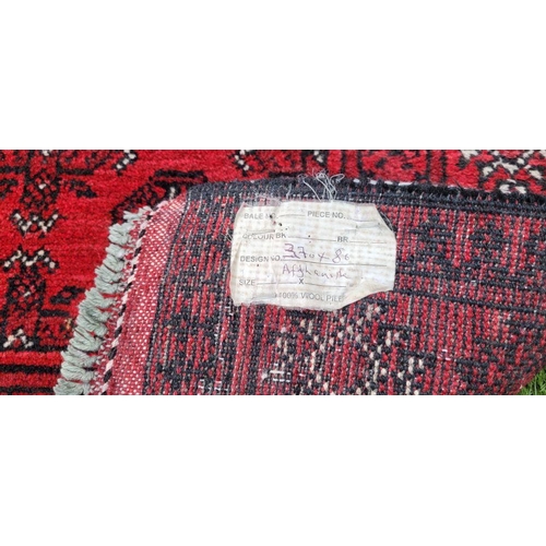 18 - A TRADITIONAL AFGHAN RUNNER RUG, hand knotted with beautiful vegetable dyed yarn, pure wool. This ru... 