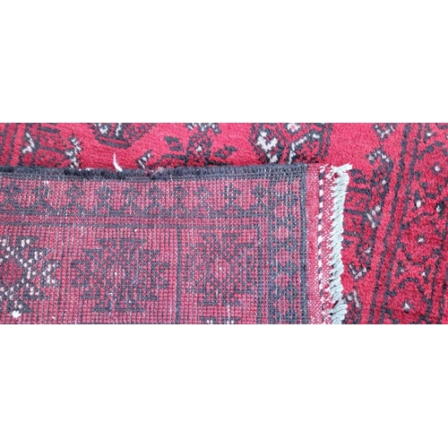 18 - A TRADITIONAL AFGHAN RUNNER RUG, hand knotted with beautiful vegetable dyed yarn, pure wool. This ru... 