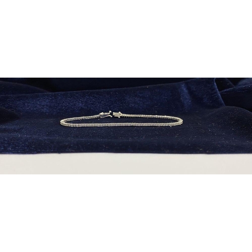 2 - A FANTASTIC 14CT WHITE GOLD DIAMOND TENNIS BRACELET, with 3.50cts total diamonds, complete with safe... 