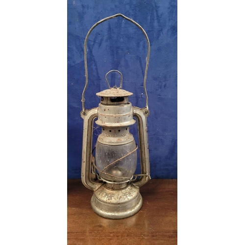 201 - TWO VINTAGE OIL LAMPS, (i) A vintage Anchor Brand kerosene lamp, with swing handle, numbered 235, 36... 