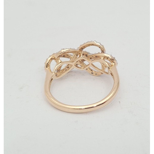 21 - A LOVELY 10CT YELLOW GOLD & DIAMOND DOUBLE INFINITY KNOT RING, a really pretty design, with a ribbon... 