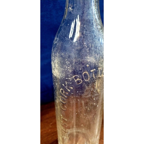 216 - A LARGE COLLECTION OF ANTIQUE IRISH GLASS JARS/BOTTLES, includes mostly clear glass with a few brown... 