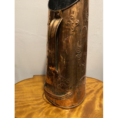 217 - A VINTAGE COPPER COAL SCUTTLE, with two handles and embossed design to body. Dimensions: 55cm high a... 