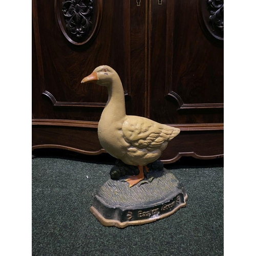 219 - A VINTAGE PAINTED CAST METAL DOOR STOP, in the form of Easter Goose. Dimensions: 32cm high approx.