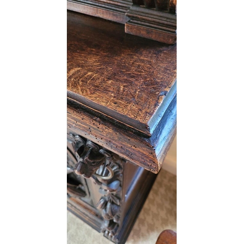 22 - A VERY FINE & LARGE FRENCH CARVED OAK STAINED GLAZED HUNT SIDEBOARD CABINET, circa 1800s, with a car... 