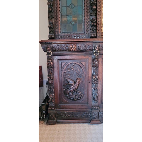 22 - A VERY FINE & LARGE FRENCH CARVED OAK STAINED GLAZED HUNT SIDEBOARD CABINET, circa 1800s, with a car... 