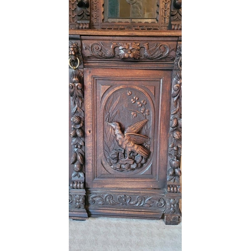 22 - A VERY FINE & LARGE FRENCH CARVED OAK STAINED GLAZED HUNT SIDEBOARD CABINET, circa 1800s, with a car... 