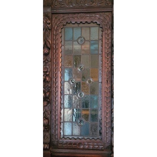 22 - A VERY FINE & LARGE FRENCH CARVED OAK STAINED GLAZED HUNT SIDEBOARD CABINET, circa 1800s, with a car... 