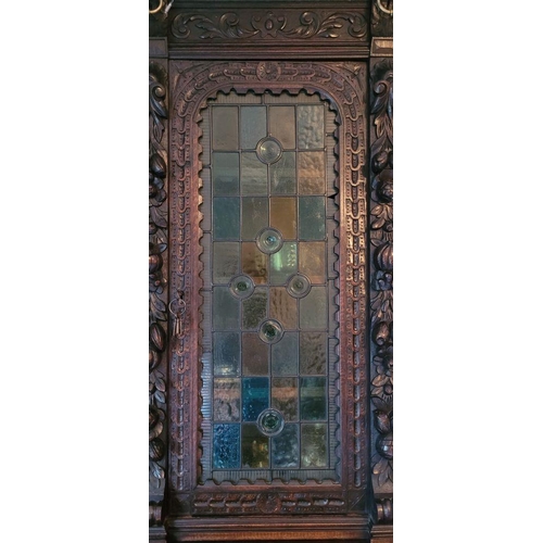 22 - A VERY FINE & LARGE FRENCH CARVED OAK STAINED GLAZED HUNT SIDEBOARD CABINET, circa 1800s, with a car... 