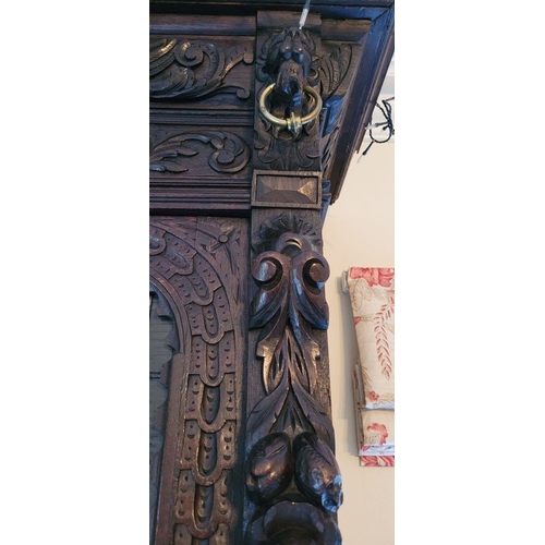 22 - A VERY FINE & LARGE FRENCH CARVED OAK STAINED GLAZED HUNT SIDEBOARD CABINET, circa 1800s, with a car... 