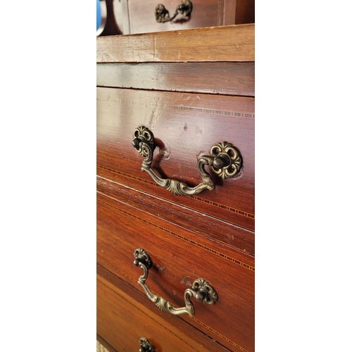 220 - AN EARLY 20TH CENTURY MIRROR BACKED CHEST OF DRAWERS / DRESSING UNIT, tp the back is raised a bevell... 