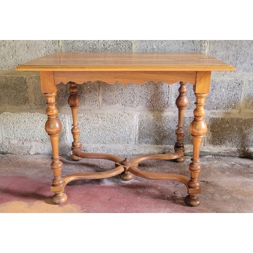 222 - A GOOD QUALITY NEATLY SIZED TABLE, with scalloped detail to the skirt, raised on turned upright supp... 