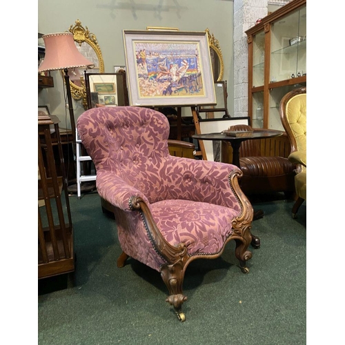 227 - A VICTORIAN MAHOGANY BUTTON BACK ARMCHAIR, with stud upholstered seat, armrests and button back. The... 