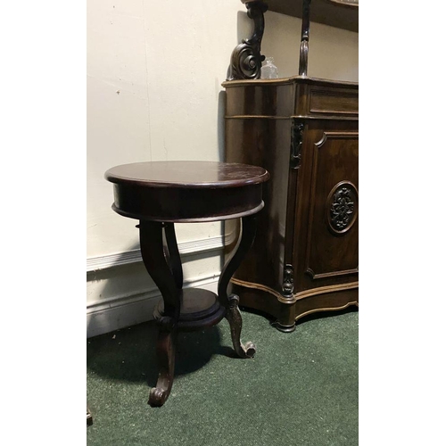 231 - A MAHOGANY CIRCULAR TOPPED OCCASIONAL TABLE, with three shaped supports joined by circular undertier... 