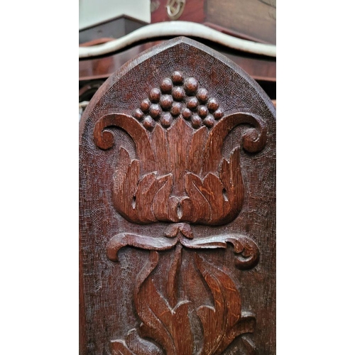 24 - A BEAUTIFUL HAND CARVED FOLDING WOODEN SCREEN, the front of each of the three panels decorated with ... 