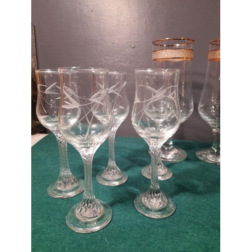 243 - A GREAT SELECTION OF VINTAGE GLASSES, in a variety of patterns and designs, including etched glasses... 