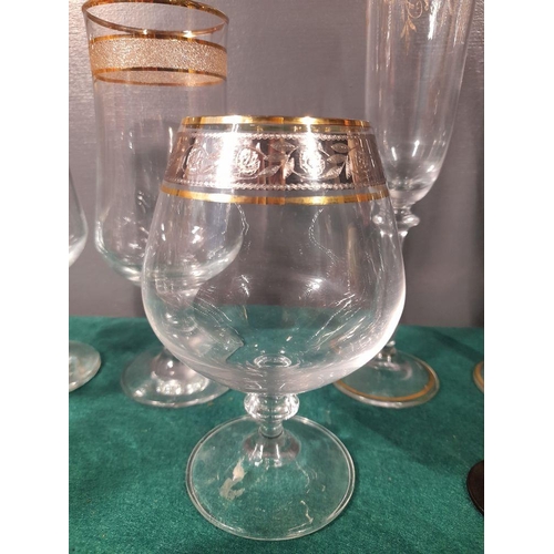 243 - A GREAT SELECTION OF VINTAGE GLASSES, in a variety of patterns and designs, including etched glasses... 