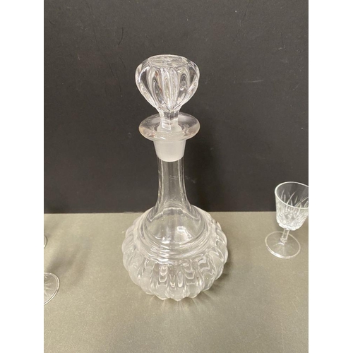 244 - A CUT GLASS DECANTER ALONG WITH SIX PORT/SHERRY GLASSES, the decanter of shaft and globe form with f... 