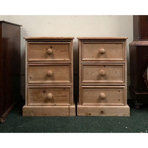 246 - A PAIR OF PINE THREE DRAWER BEDSIDE LOCKERS/CHESTS, three drawers raised on platform bases. Please n... 