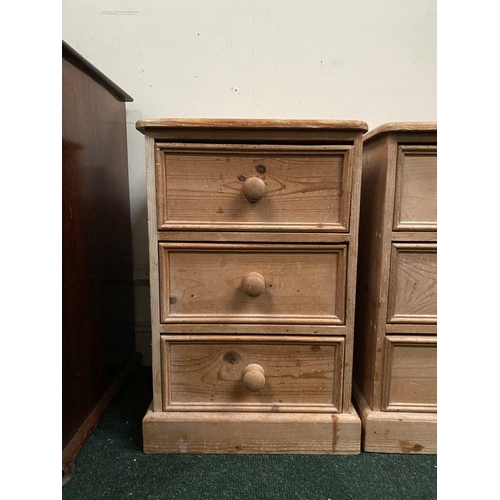 246 - A PAIR OF PINE THREE DRAWER BEDSIDE LOCKERS/CHESTS, three drawers raised on platform bases. Please n... 