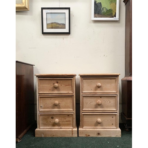 246 - A PAIR OF PINE THREE DRAWER BEDSIDE LOCKERS/CHESTS, three drawers raised on platform bases. Please n... 