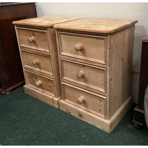 246 - A PAIR OF PINE THREE DRAWER BEDSIDE LOCKERS/CHESTS, three drawers raised on platform bases. Please n... 