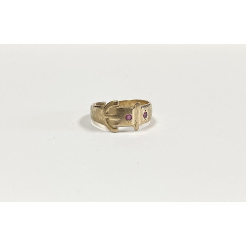 247 - A VINTAGE IRISH 9CT GOLD BELT RING, adjustable in size set with two round cut pink gemstones, Hallma... 