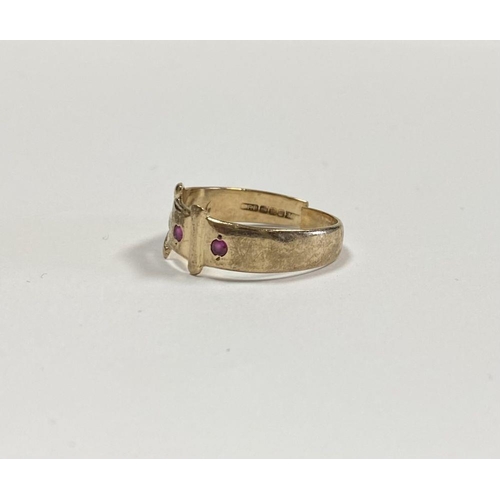 247 - A VINTAGE IRISH 9CT GOLD BELT RING, adjustable in size set with two round cut pink gemstones, Hallma... 