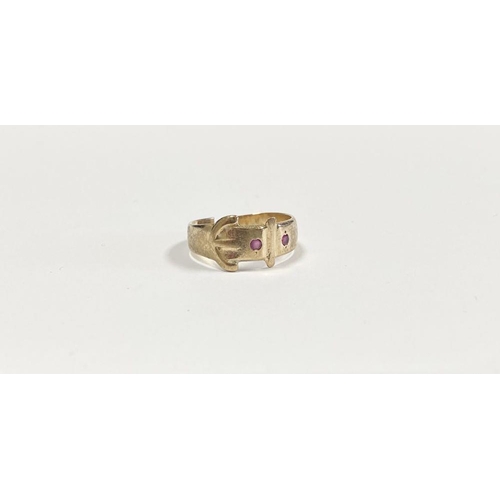 247 - A VINTAGE IRISH 9CT GOLD BELT RING, adjustable in size set with two round cut pink gemstones, Hallma... 