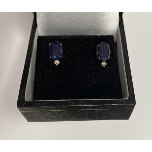 28 - A PAIR OF 18CT GOLD SAPPHIRE DIAMOND STUD EARRINGS, with oval cut sapphires in four prong claw setti... 