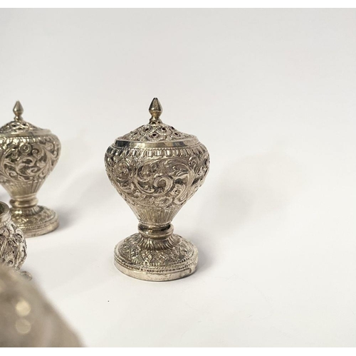 37 - AN EXCELLENT CASED INDIAN SILVER CONDIMENT SET, c.1890, to include four salts, four mustard pots and... 