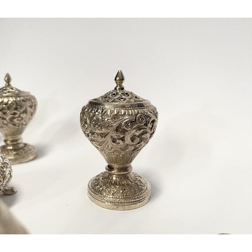 37 - AN EXCELLENT CASED INDIAN SILVER CONDIMENT SET, c.1890, to include four salts, four mustard pots and... 